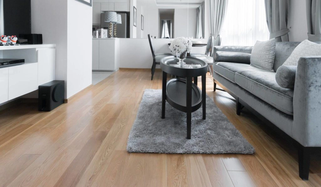 living room with gray furniture and vinyl flooring arlington tx